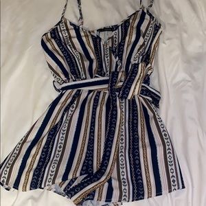 Romper size small fits like a medium.